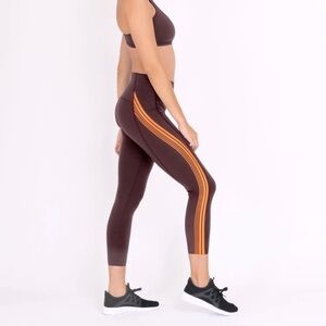 SPANX Contour orange stripe leggings. NWT Size S